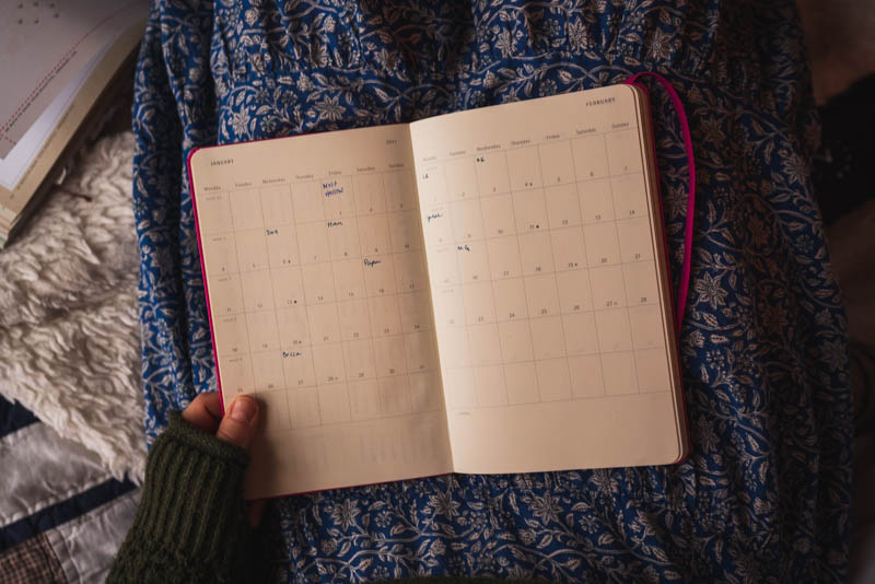 An image of me opening up my new planner, beginning with jotting down everyone's birthdays!