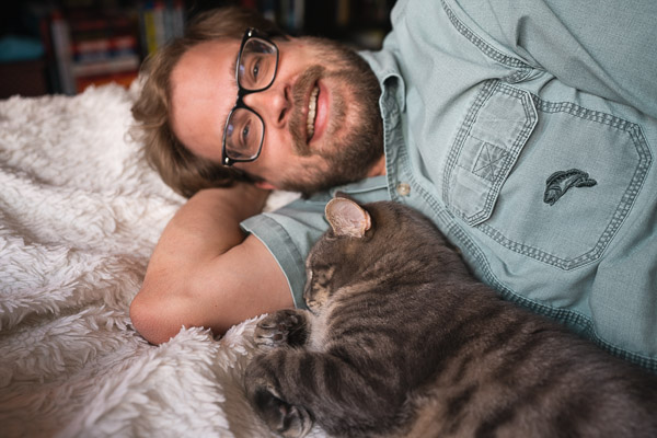 Ned snuggled in Bryan's arm on the bed as we tackle learning new things.