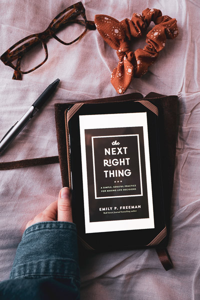 A moody themed book photo of The Next Right Thing, by Emily P Freeman