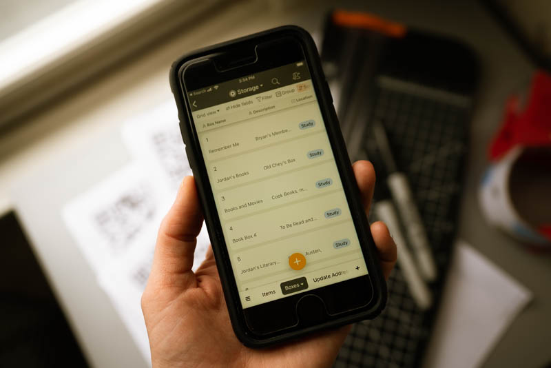 A close up look at our Airtable powered storage app on my iPhone, featuring the first packed boxes, the books.